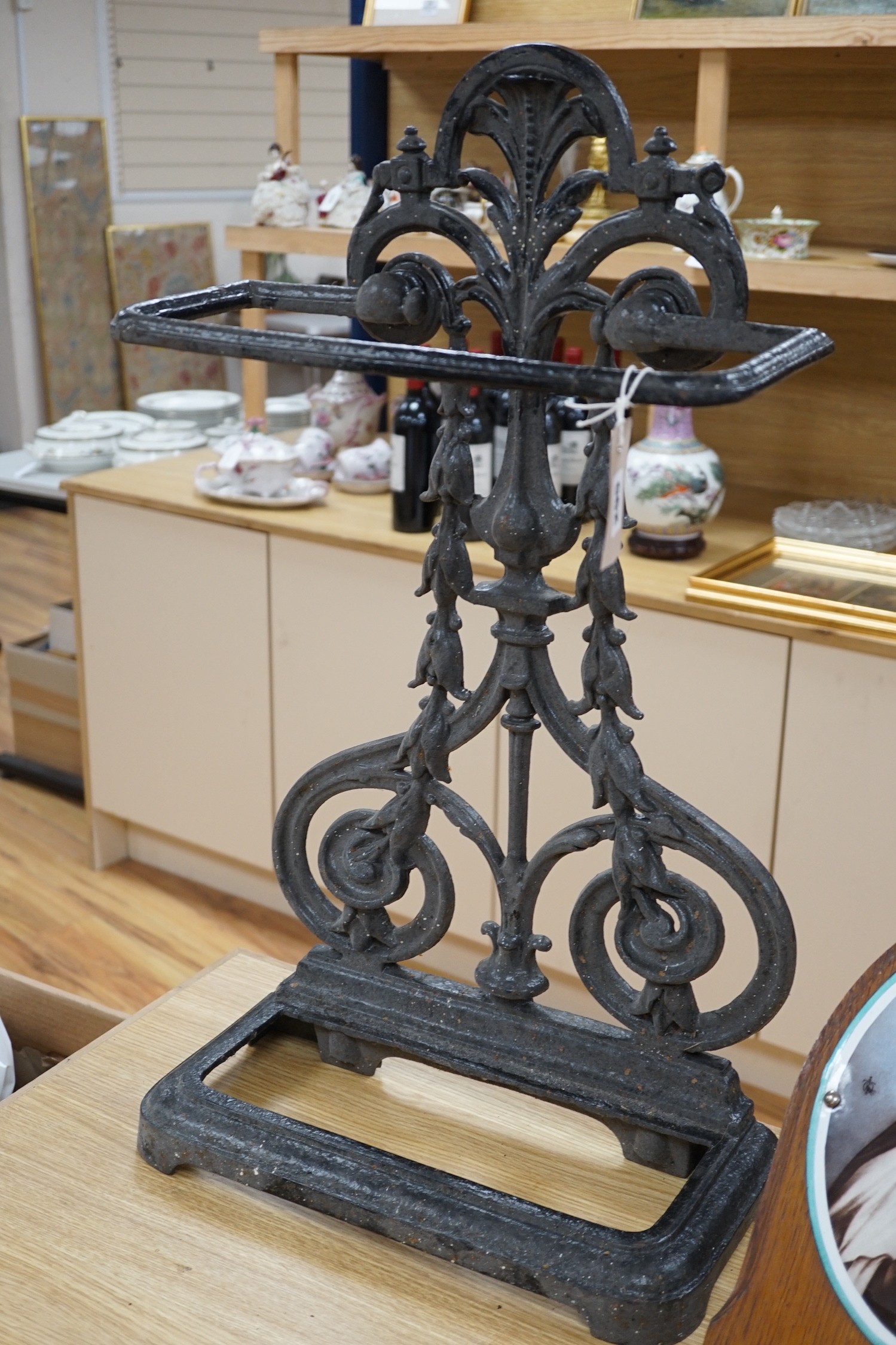 A Victorian cast iron umbrella stand, lacking tray to base, 72.5 cms high